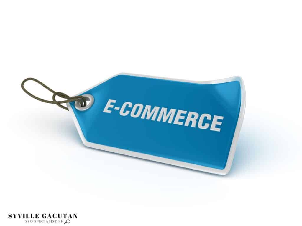 Blue price tag with "E-COMMERCE" text in white, featuring a string loop.