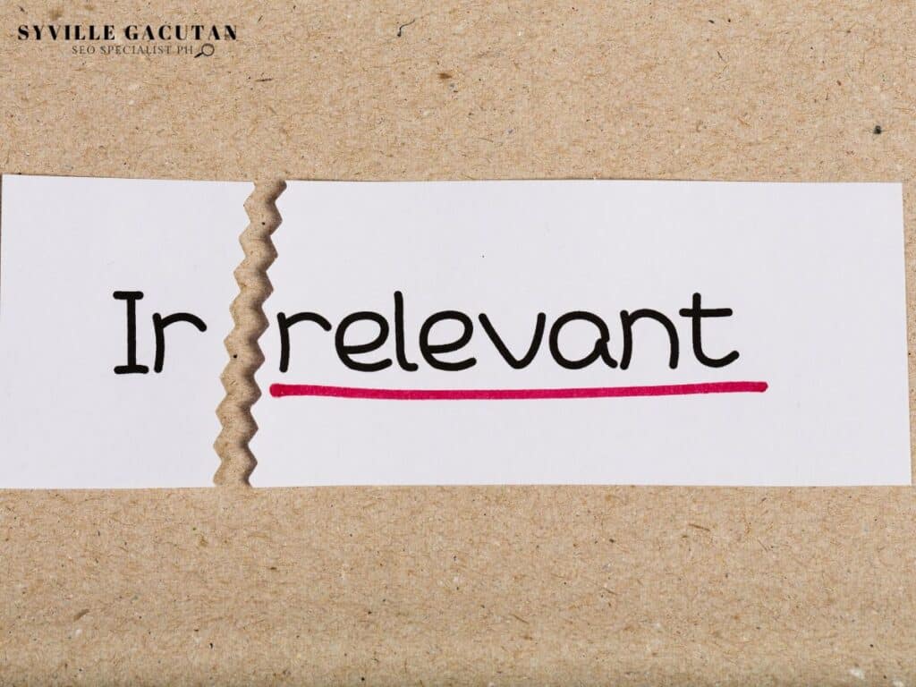Torn paper with "Irrelevant" written and underlined, suggesting removal of non-relevant content.