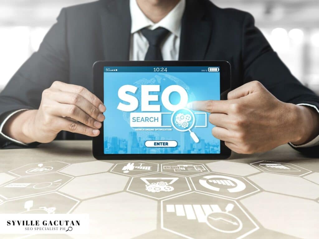 Man holding a tablet with SEO interface displayed.