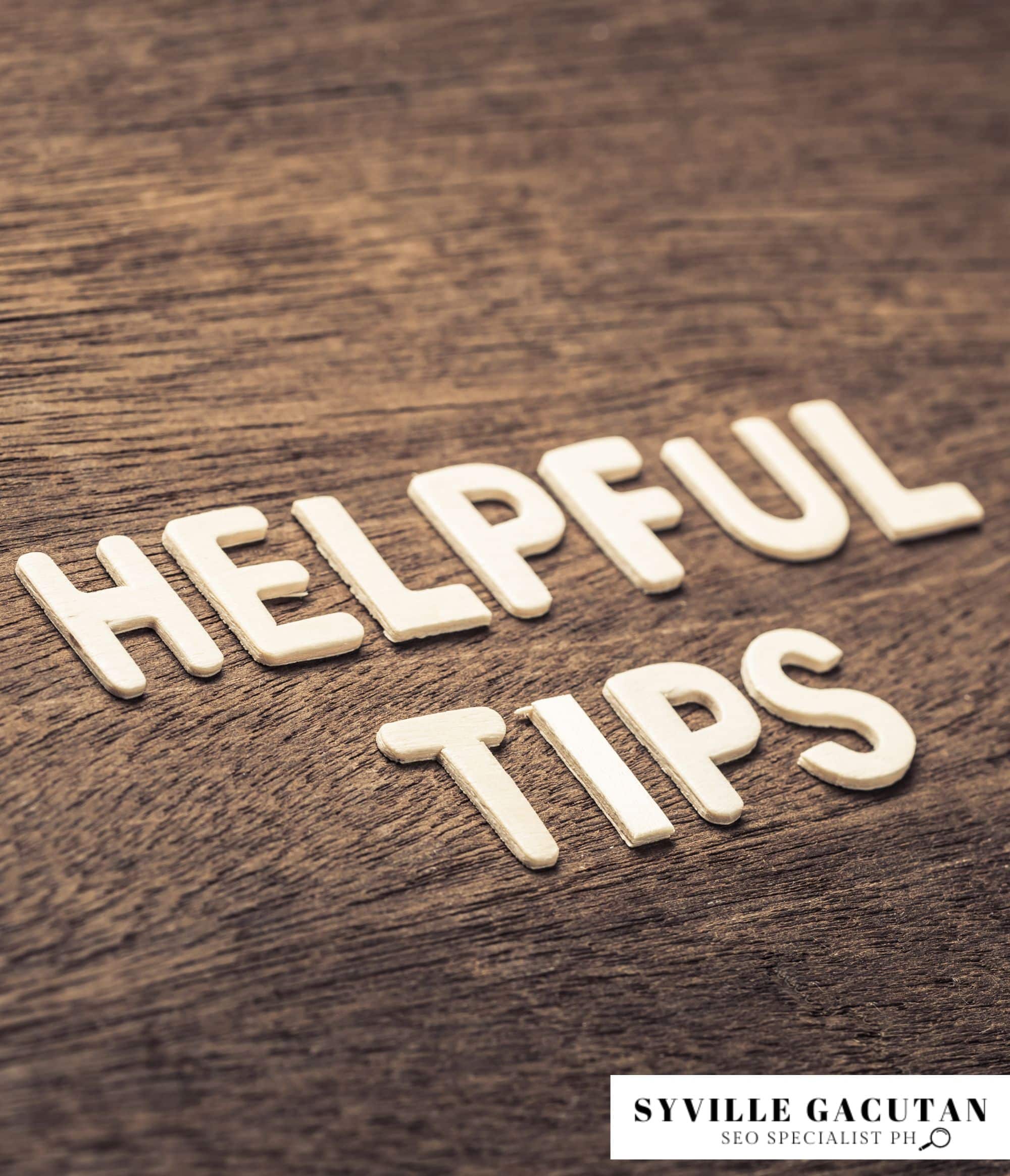 Wooden "Helpful Tips" letters on a textured wooden surface.