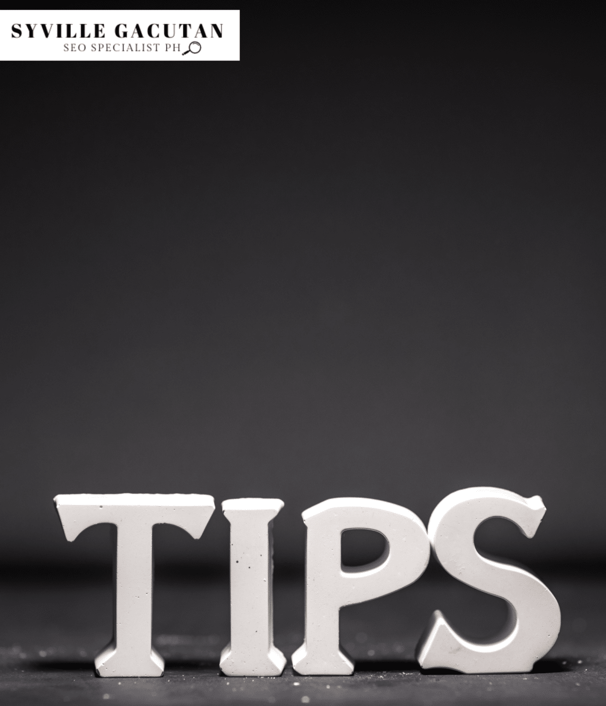 The image shows white 3D letters spelling "TIPS" against a dark gray background.