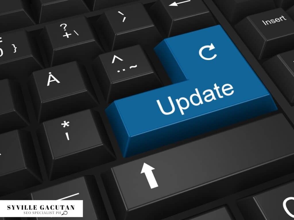 A blue "Update" key on a black keyboard.
