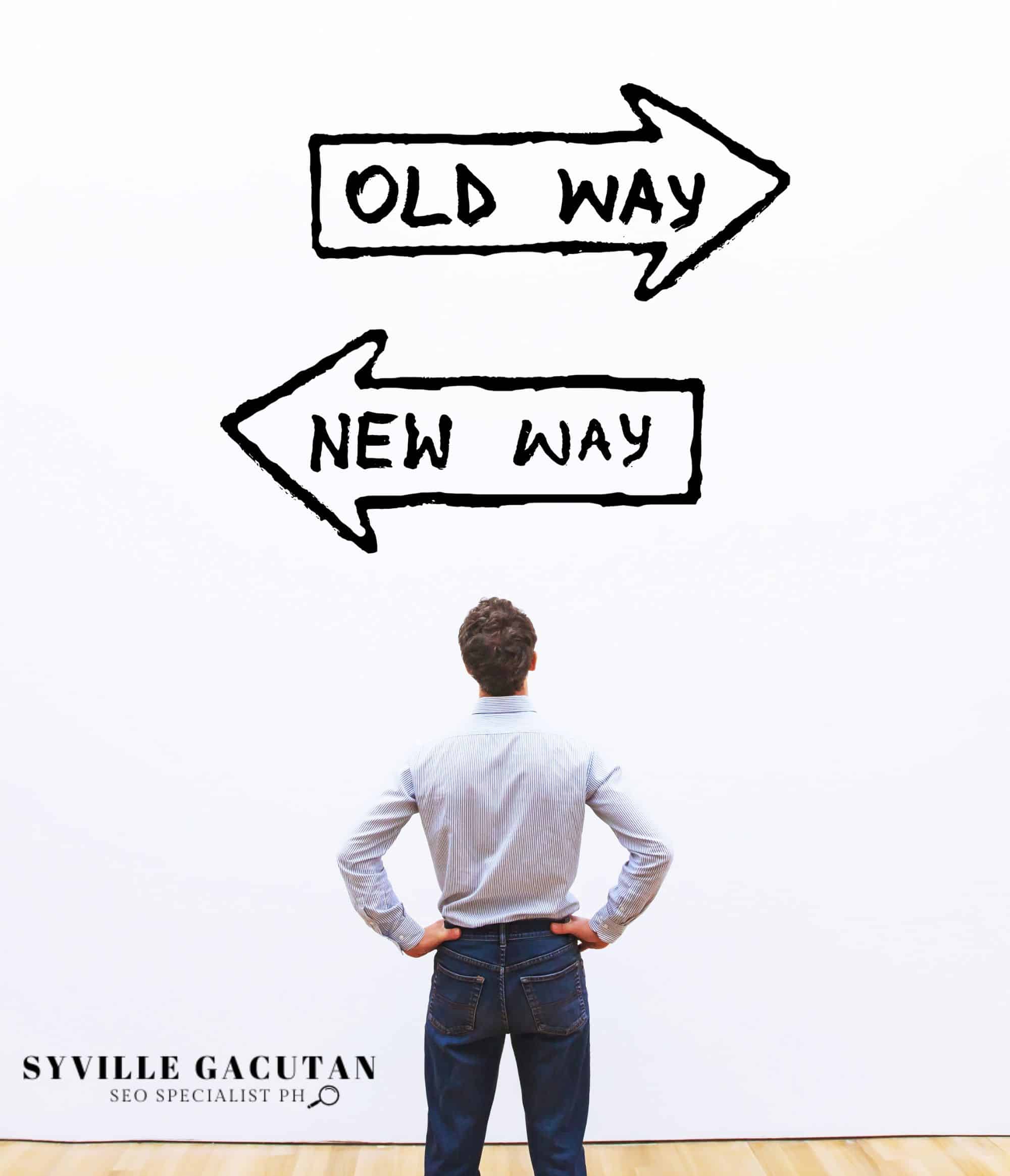 A person in business attire faces two directional arrows labeled "OLD WAY" and "NEW WAY"