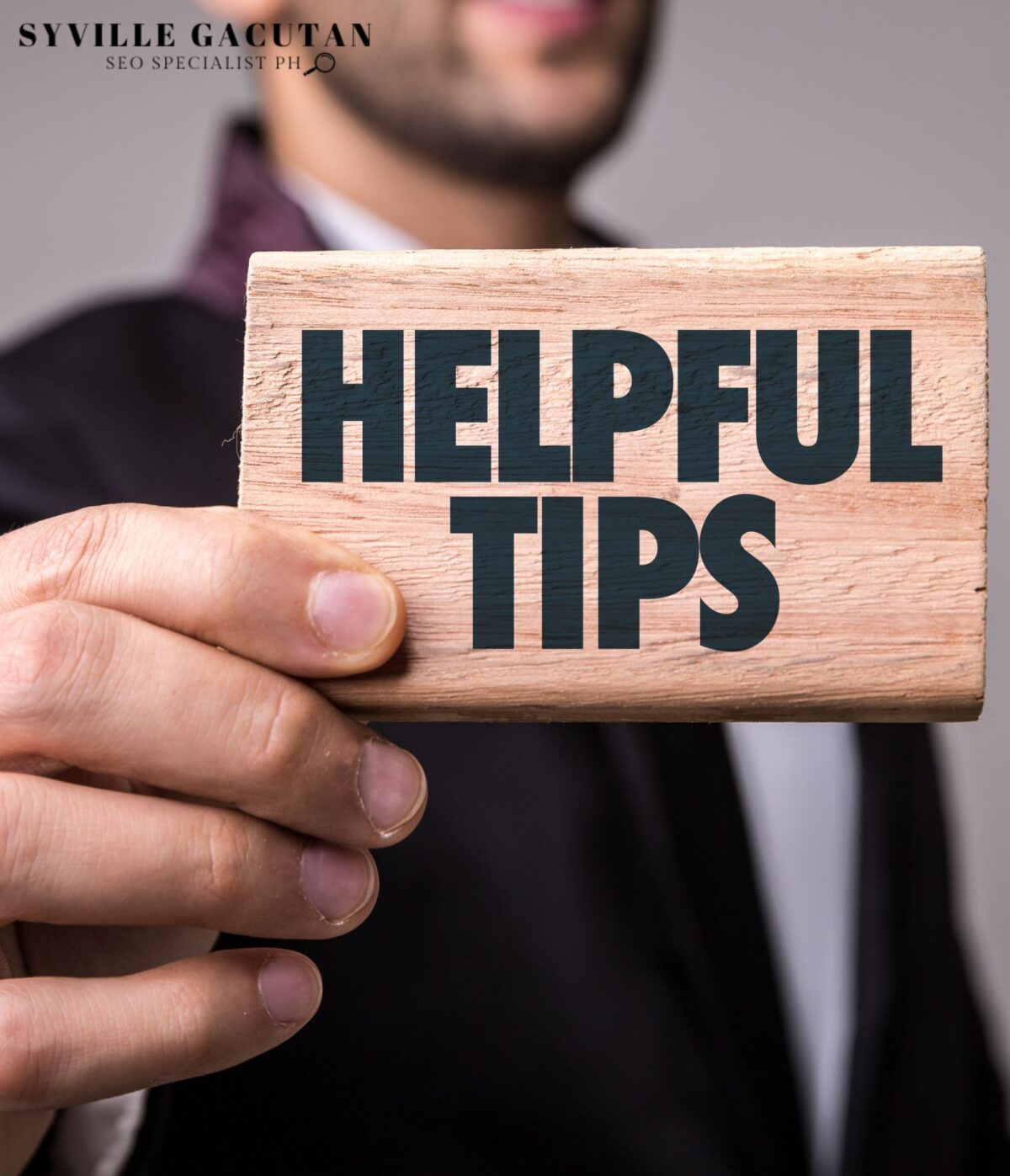 Person holding "HELPFUL TIPS" sign.