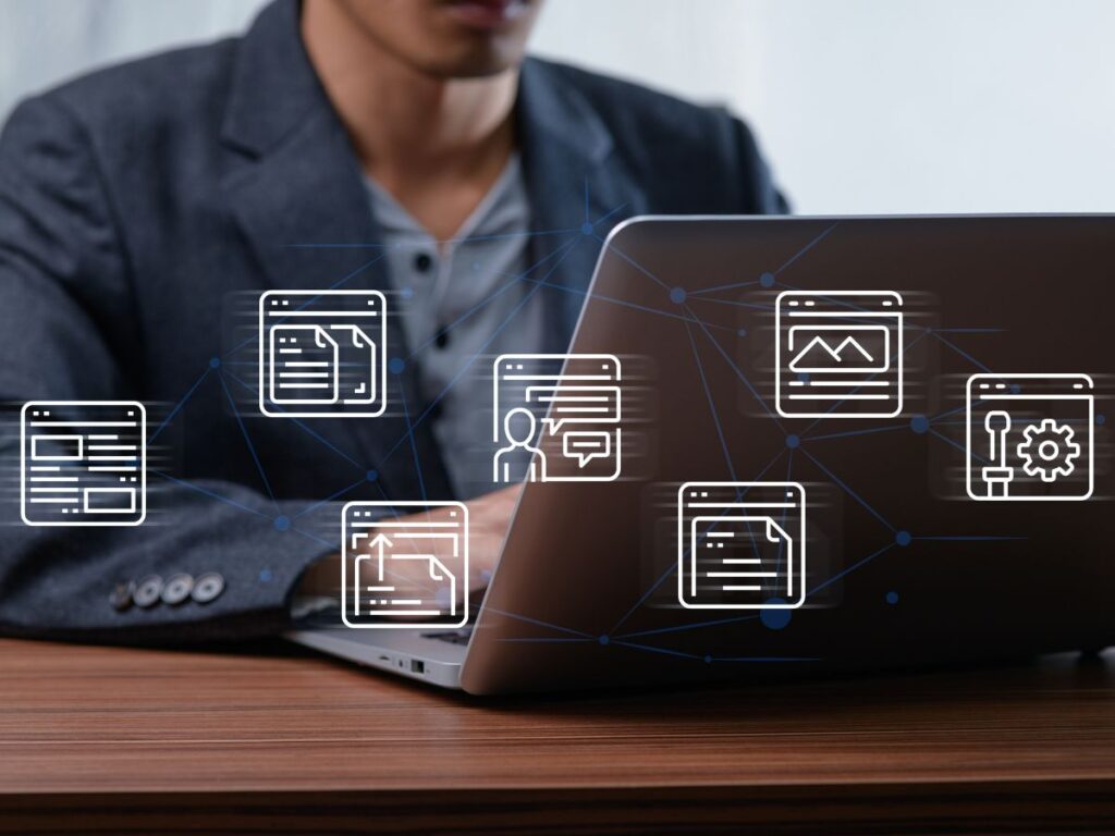 Laptop with content management icons.