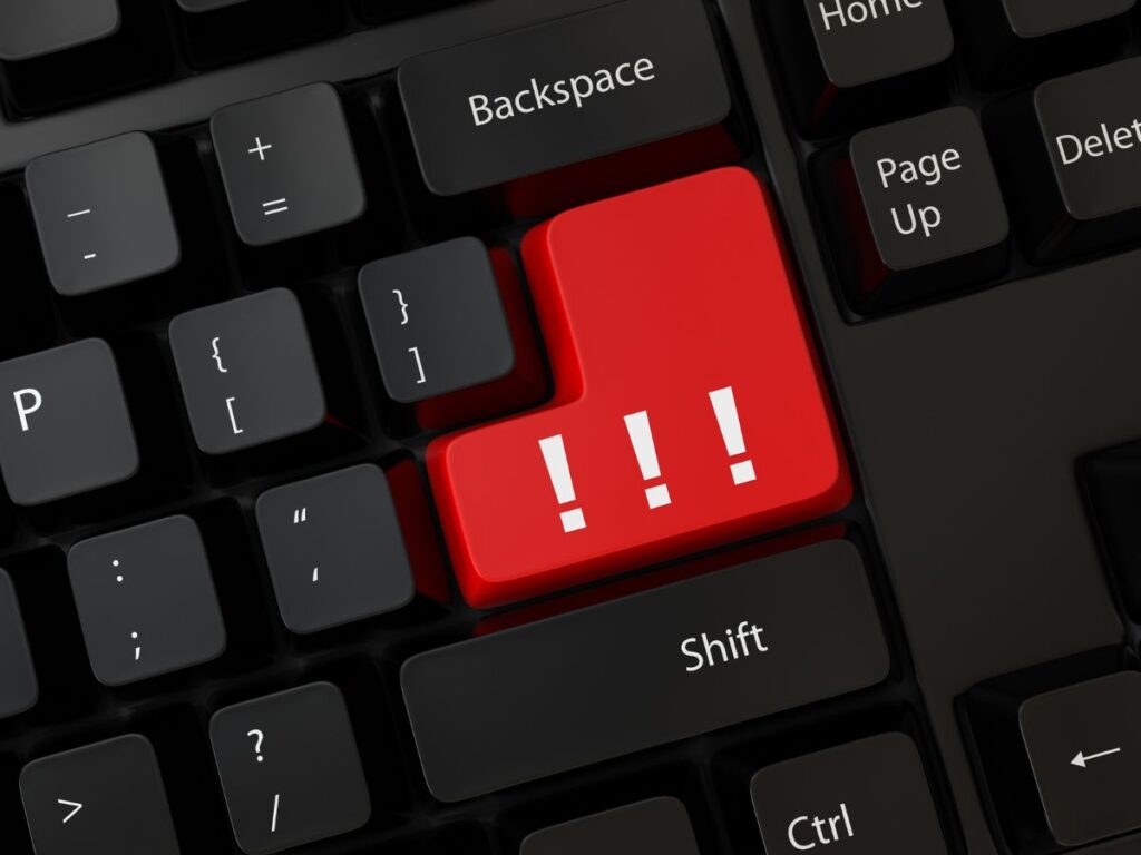 Keyboard warning key with exclamation marks.