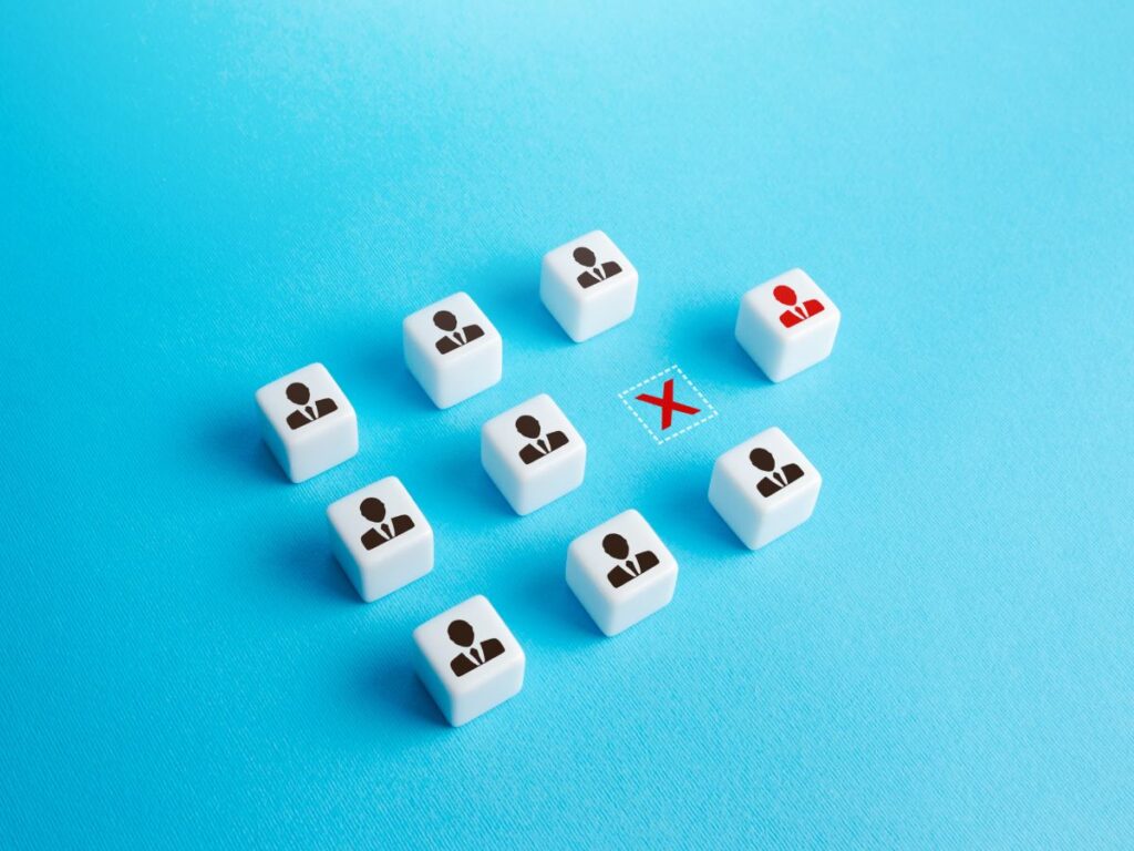 Cubes showing user icons and a red X.