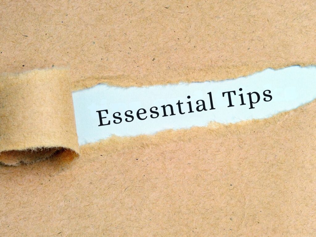 Torn paper revealing “Essential Tips.”