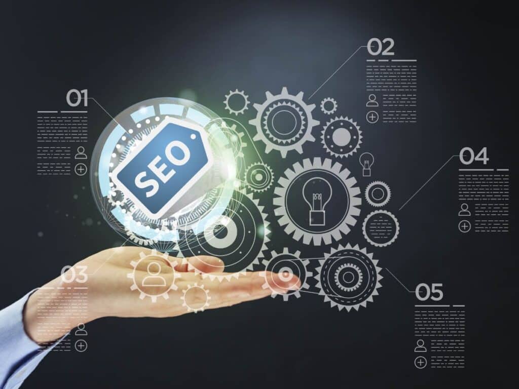Hand holding a glowing SEO tag with gears and process icons.