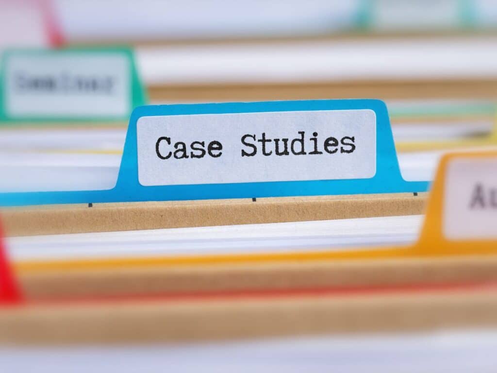 Folder tab labeled “Case Studies” among organized files.