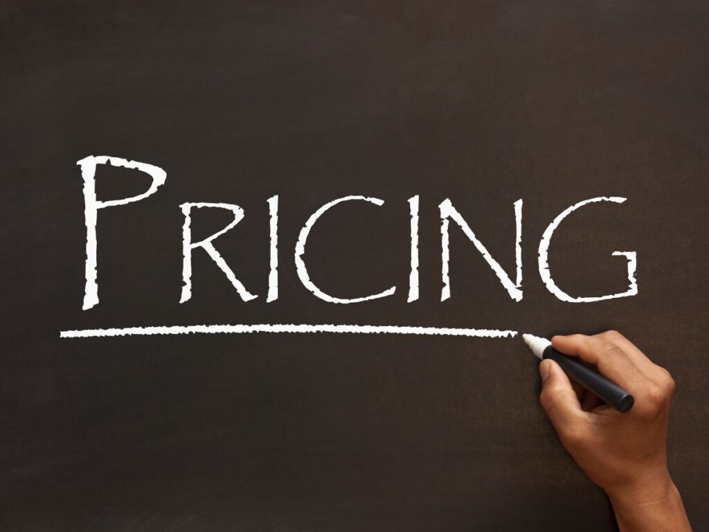 Chalkboard showing the word “PRICING”
