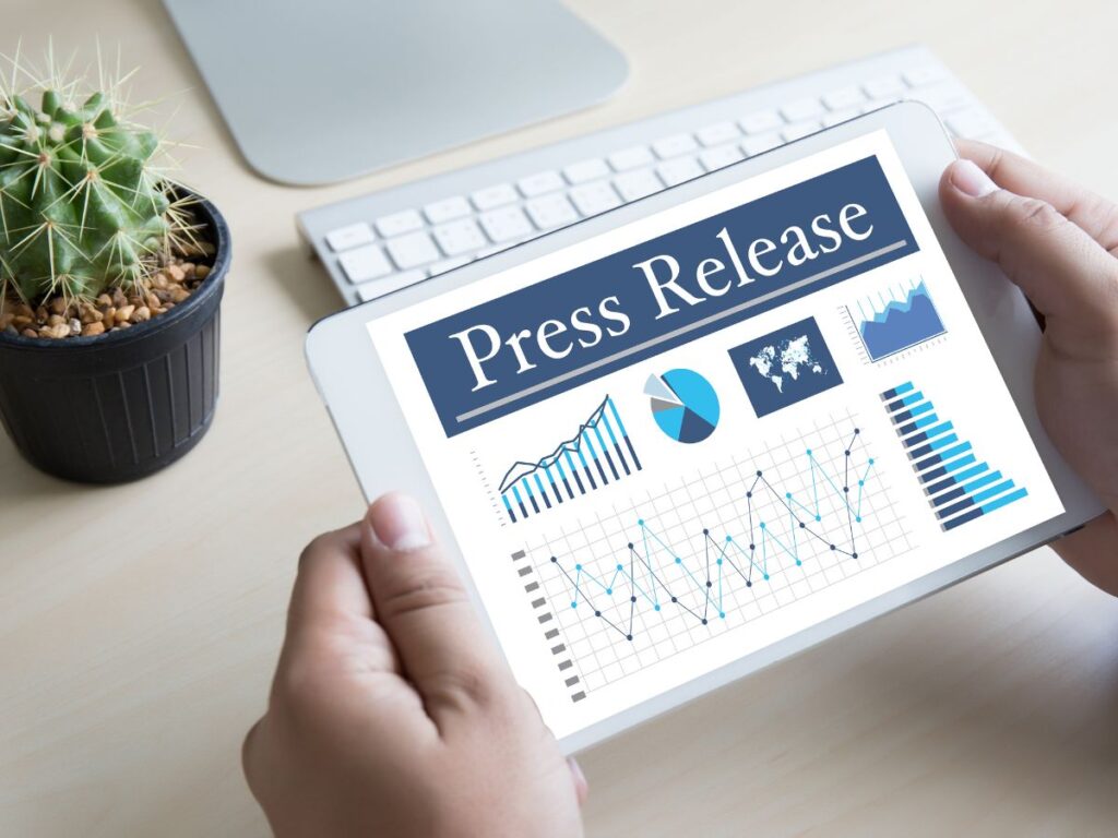Tablet displaying a press release report.