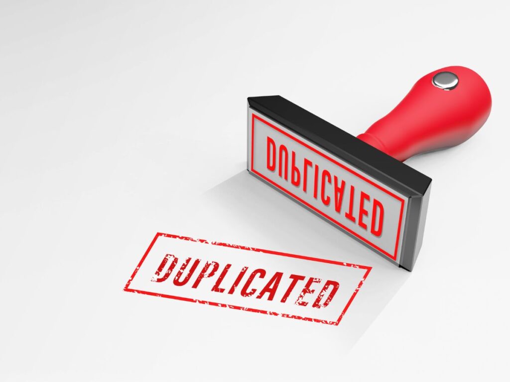 Rubber stamp marking “Duplicated.”