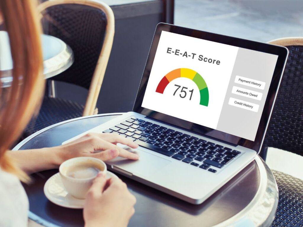 Laptop showing an E-E-A-T score dashboard.