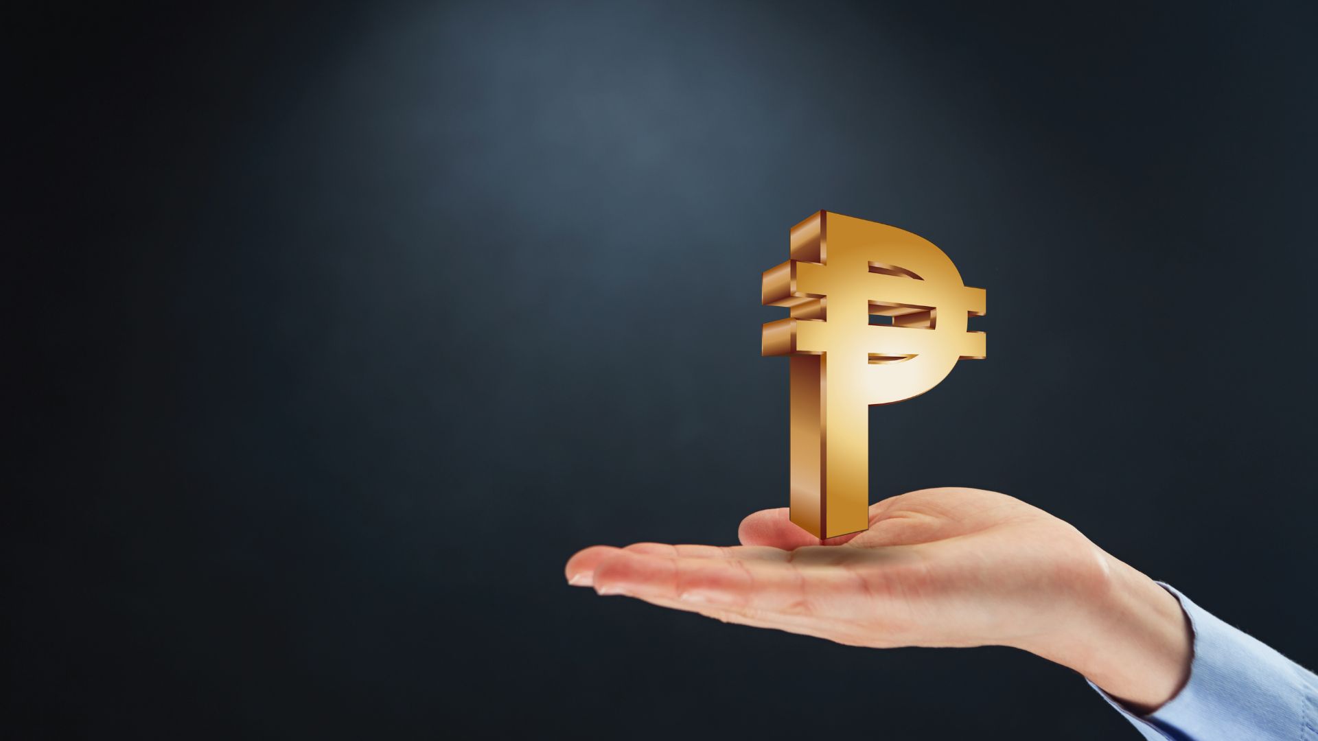 Hand holding a golden peso symbol