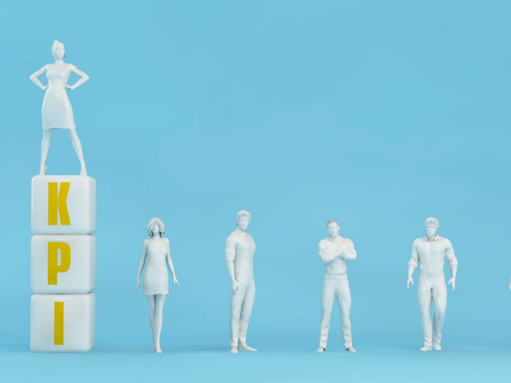 White figures beside stacked KPI blocks.