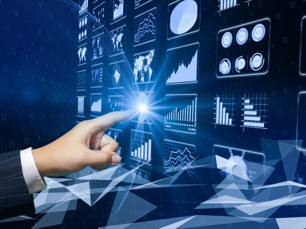 Hand touching a digital dashboard filled with charts and graphs.