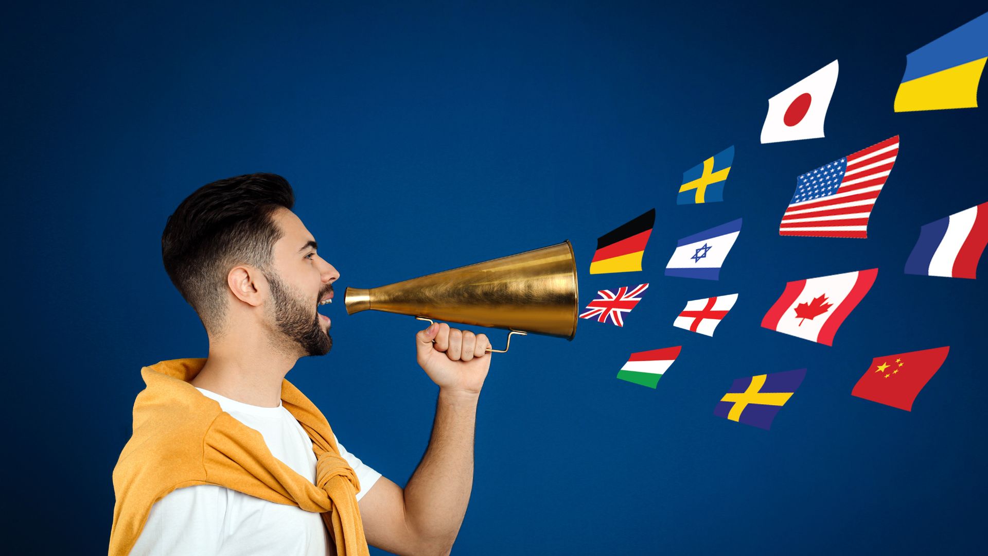 Man using megaphone with international flags.