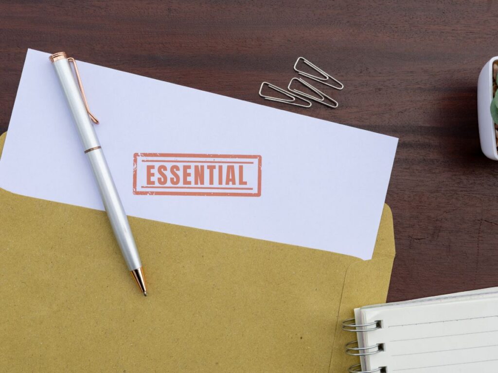 Paper stamped with “Essential.”