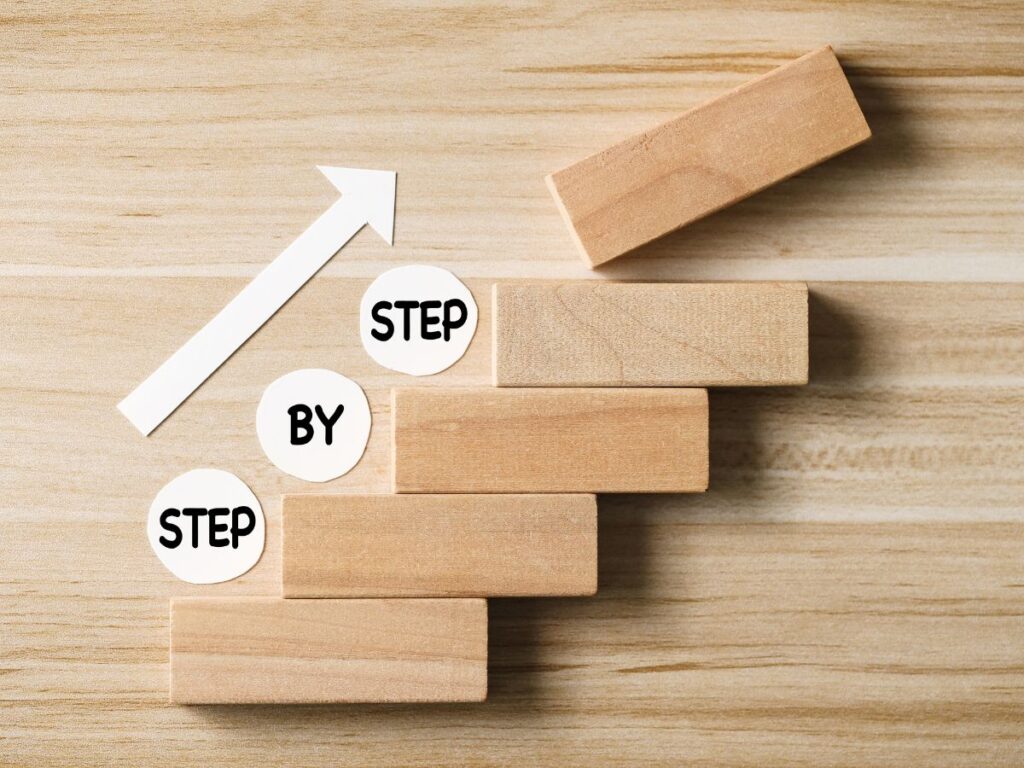 Wooden blocks forming step-by-step stairs.