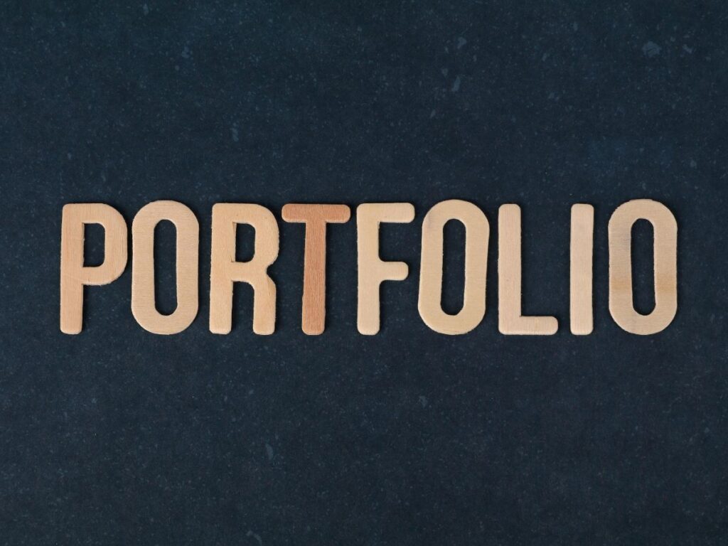 Wooden letters spelling “PORTFOLIO”