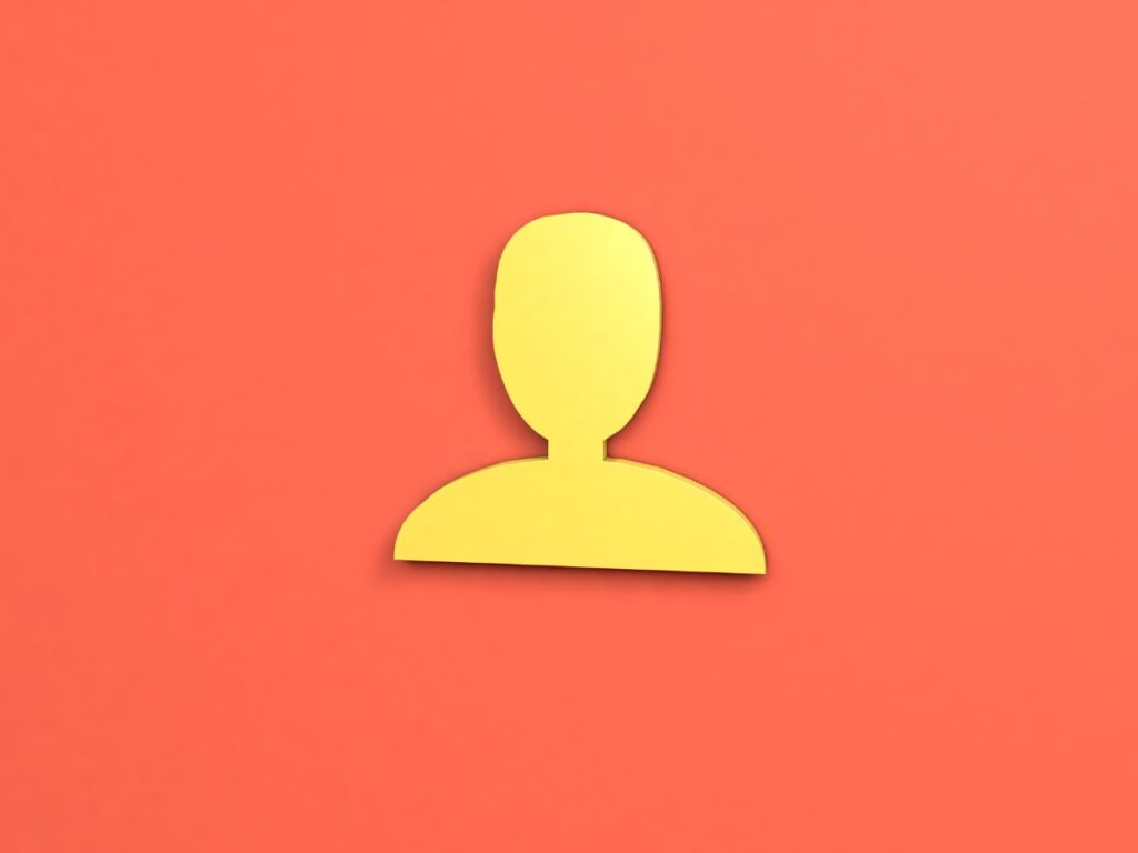 Yellow user/profile icon on orange background.