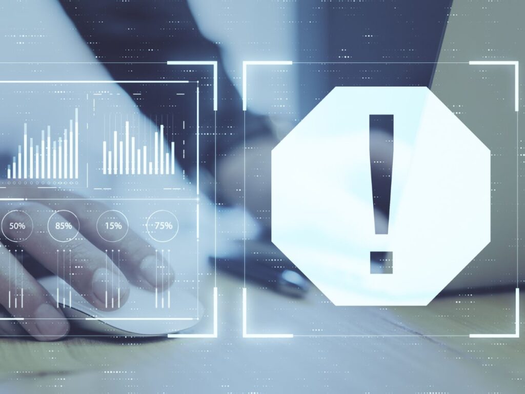 Warning icon over analytics dashboard.