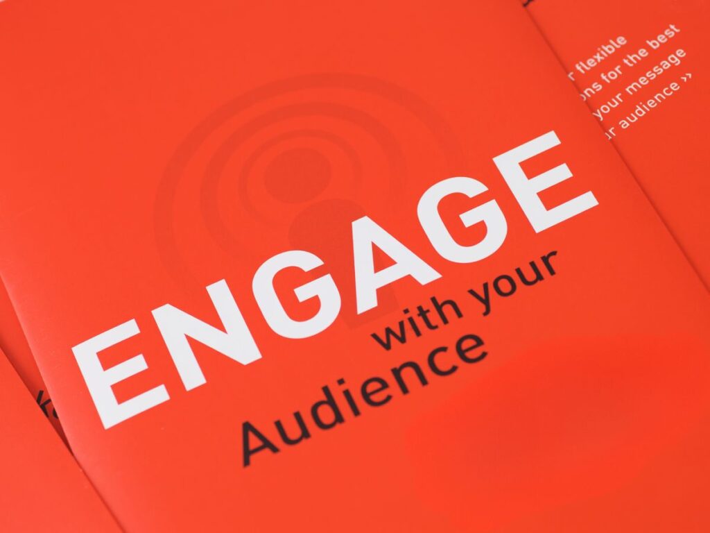 Orange page reading “Engage with your Audience”