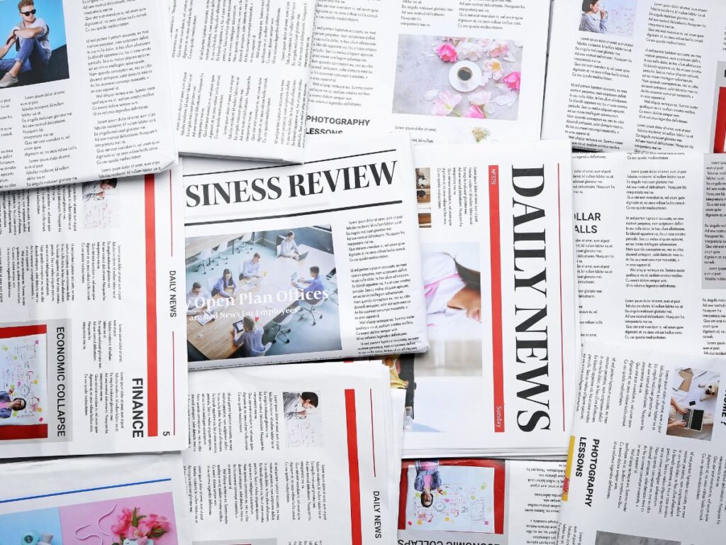 Spread of newspapers and business articles